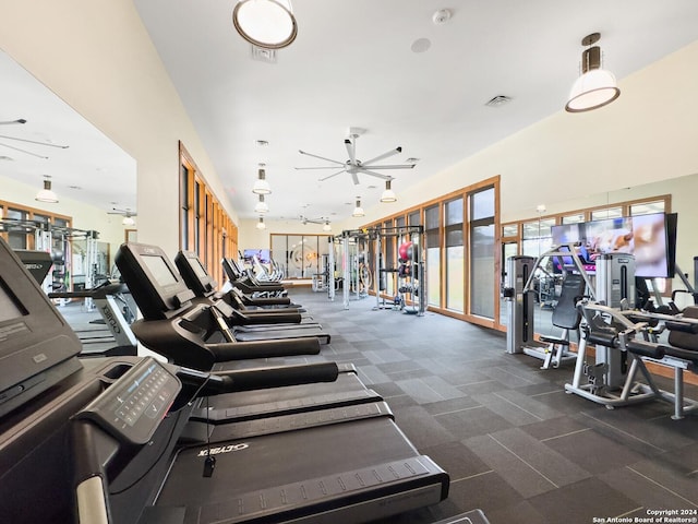 workout area featuring ceiling fan