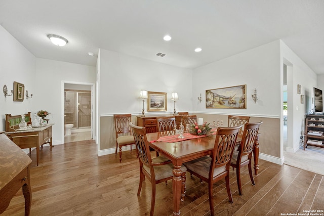 dining space featuring hardwood / wood-style flooring