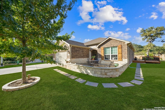 ranch-style house with a front yard, a garage, and a patio