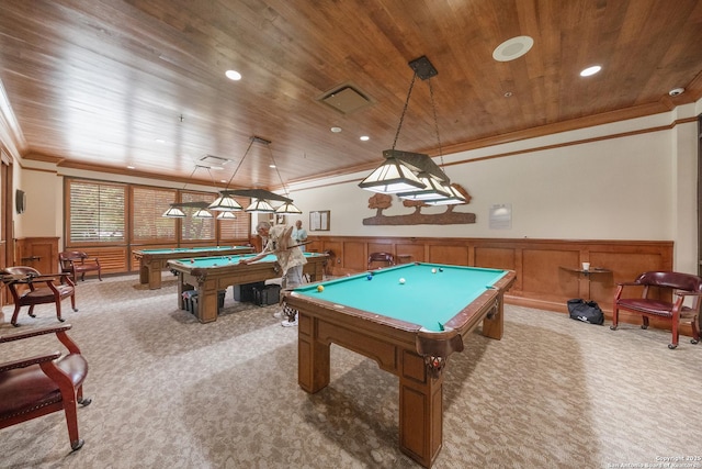 playroom with billiards, ornamental molding, wood walls, wood ceiling, and light colored carpet