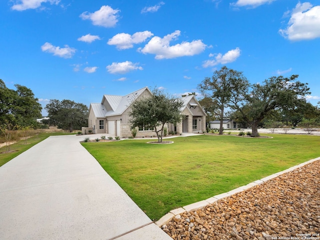 view of front of home with a front yard