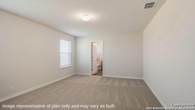 empty room featuring carpet flooring