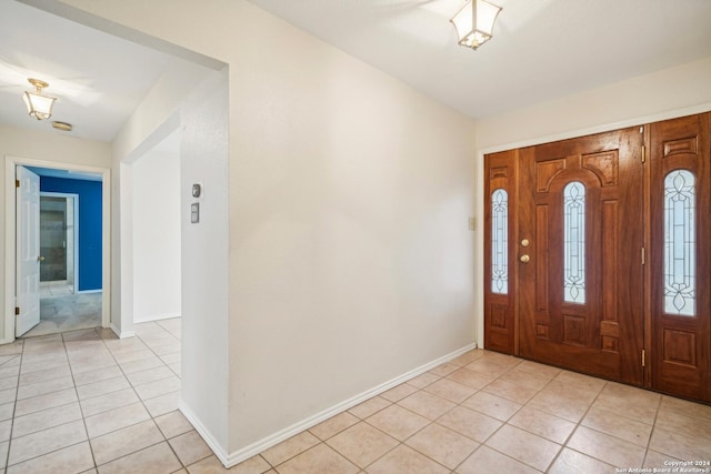 foyer with light tile patterned floors