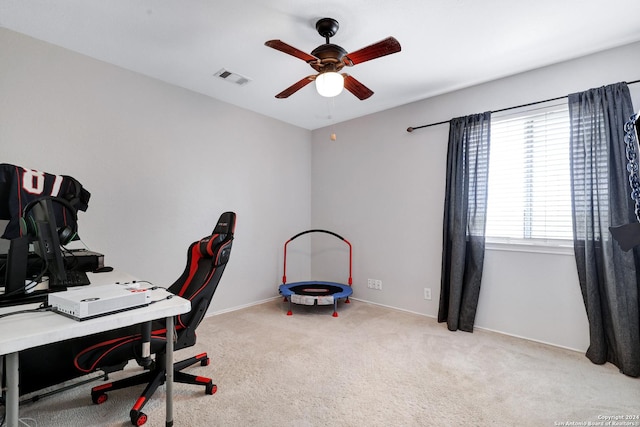 office area featuring ceiling fan and light carpet