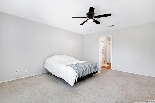 bedroom featuring ceiling fan and carpet floors