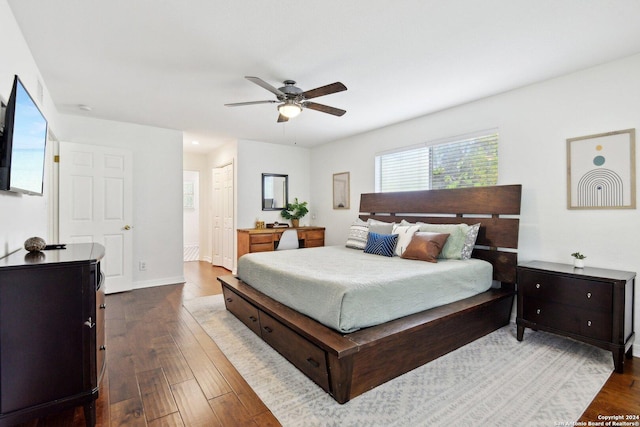 bedroom featuring ceiling fan and wood-type flooring