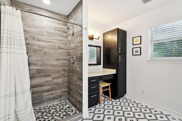 bathroom featuring a shower with curtain