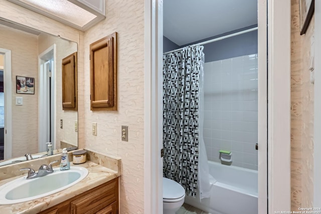 full bathroom with vanity, toilet, and shower / bathtub combination with curtain