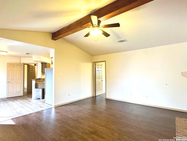 spare room with lofted ceiling with beams, dark hardwood / wood-style floors, ceiling fan, and sink