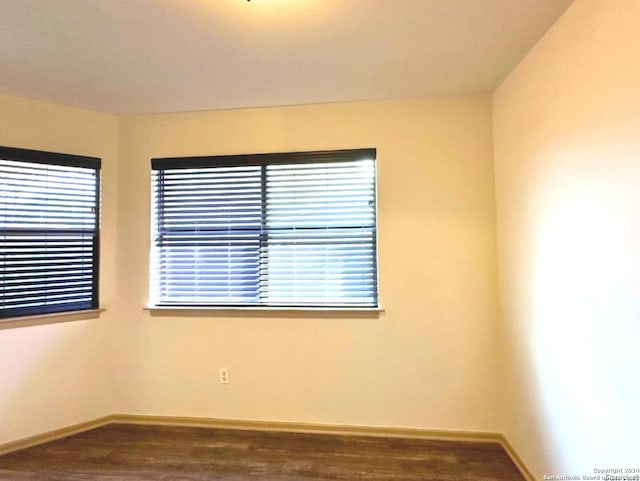 spare room featuring hardwood / wood-style flooring