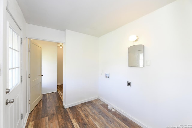 washroom featuring hookup for a washing machine, dark hardwood / wood-style floors, and electric dryer hookup