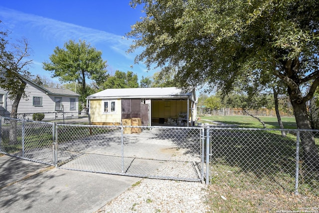 view of front of property with a carport