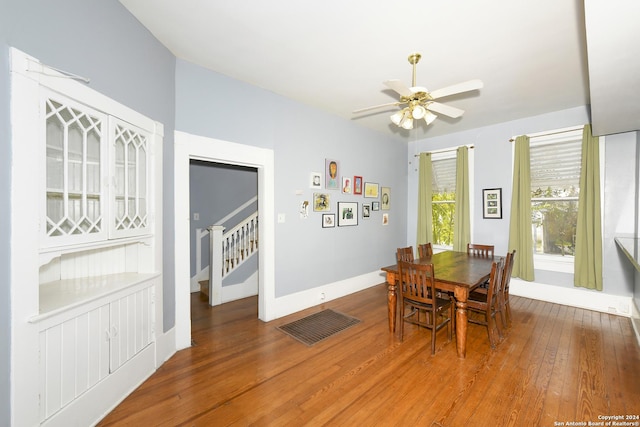 dining room featuring ceiling fan and wood-type flooring