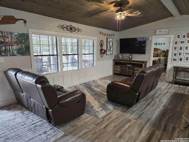 living room with vaulted ceiling with beams, hardwood / wood-style flooring, ceiling fan, and wooden ceiling