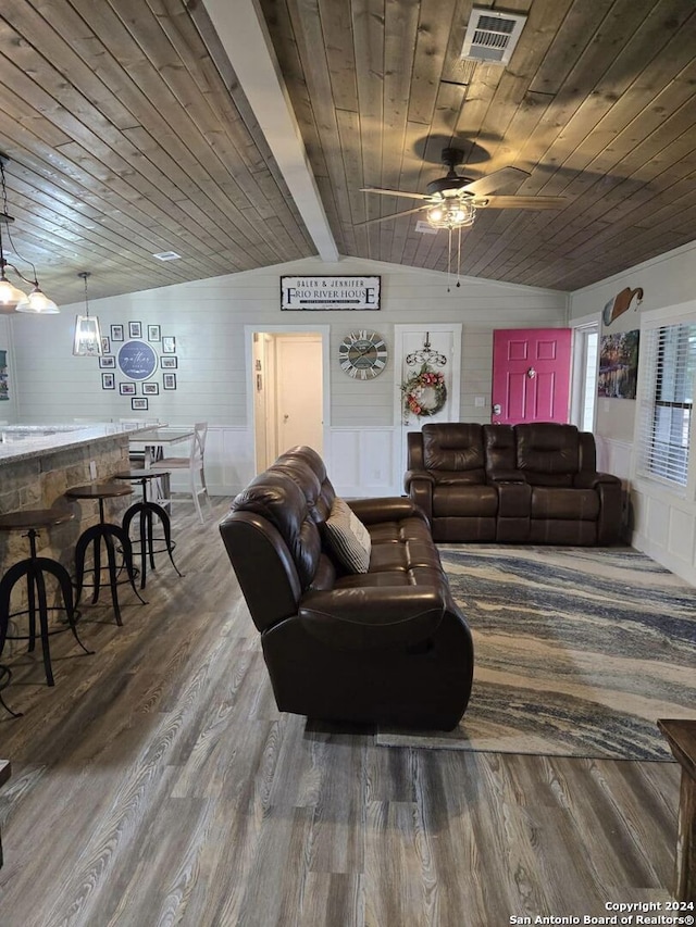 living room featuring vaulted ceiling with beams, ceiling fan, hardwood / wood-style floors, and wood ceiling