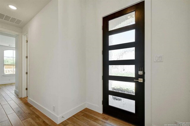 foyer entrance featuring light wood-type flooring