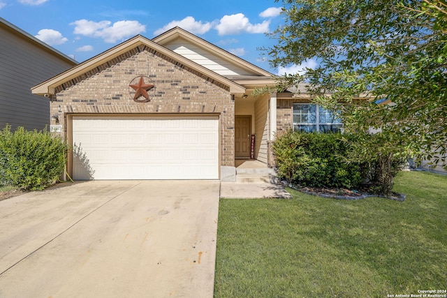 view of front facade featuring a garage and a front yard