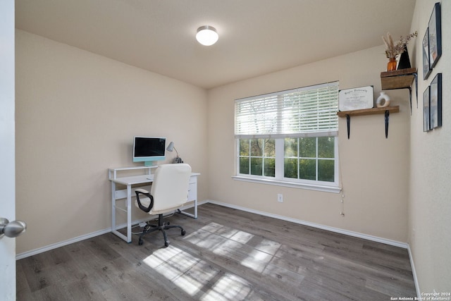 office area with hardwood / wood-style flooring