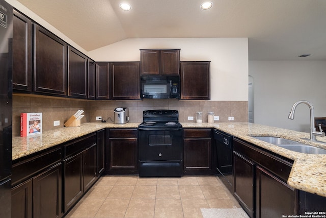 kitchen featuring backsplash, sink, black appliances, light tile patterned floors, and lofted ceiling