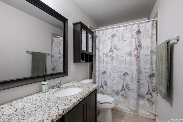 full bathroom with vanity, tile patterned flooring, toilet, a textured ceiling, and shower / tub combo with curtain