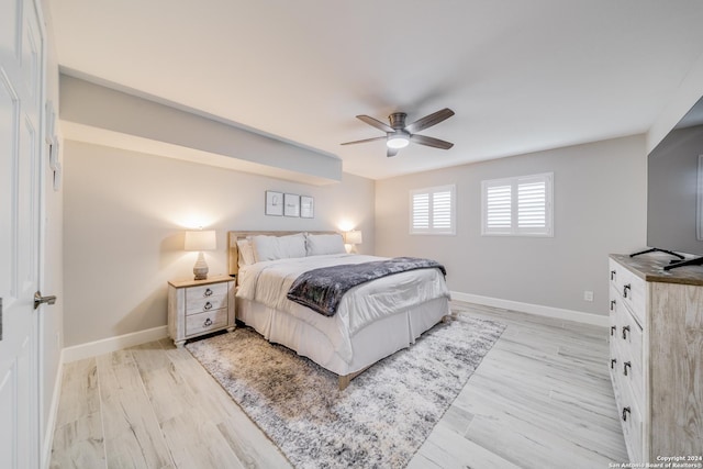 bedroom featuring ceiling fan and light hardwood / wood-style floors