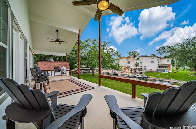 view of patio with ceiling fan