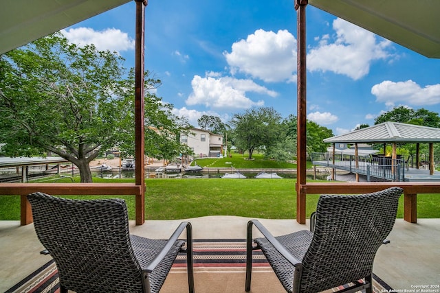 view of patio / terrace featuring a water view