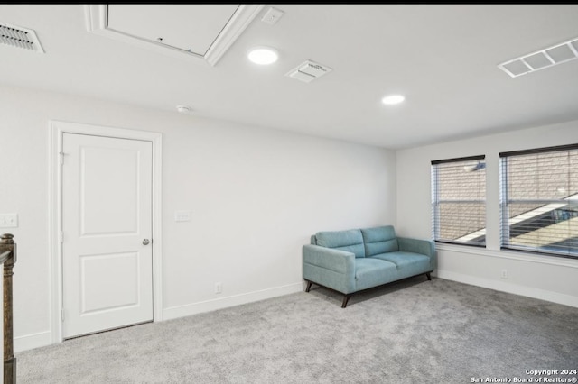 unfurnished room with light colored carpet