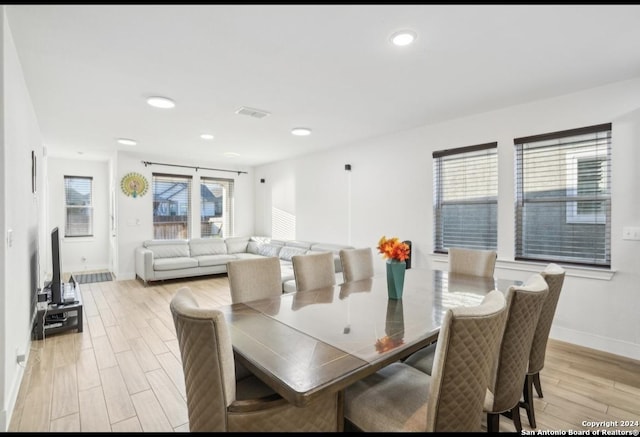 dining space featuring light hardwood / wood-style flooring