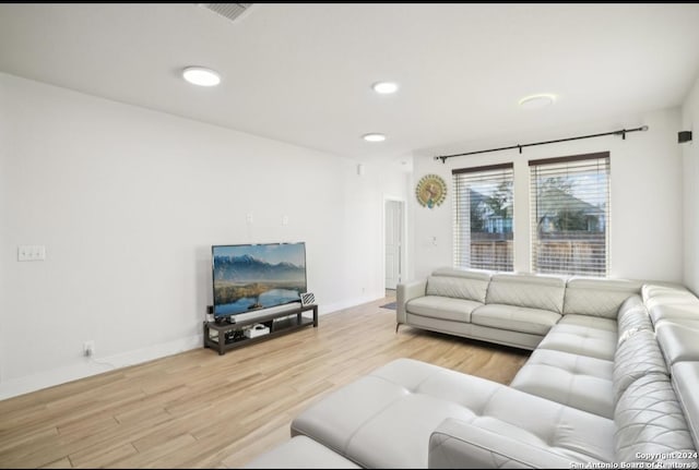 living room featuring light wood-type flooring