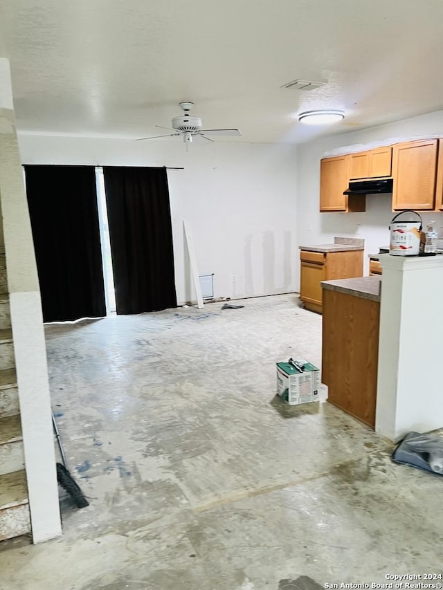 kitchen featuring ceiling fan