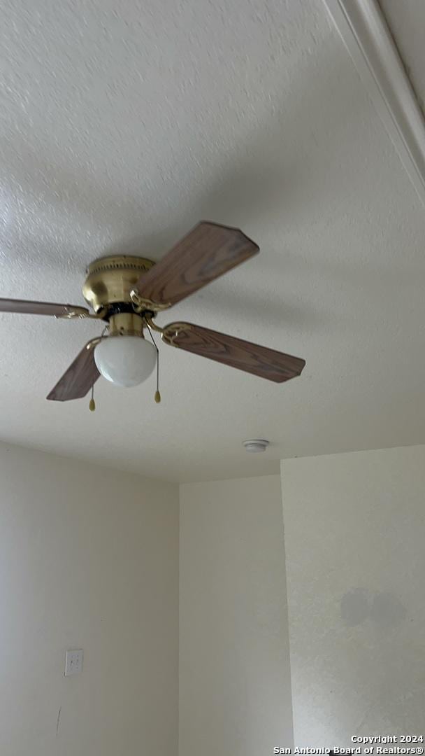 interior details with a textured ceiling