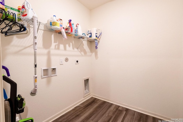 laundry area featuring hookup for an electric dryer, gas dryer hookup, dark hardwood / wood-style flooring, and hookup for a washing machine