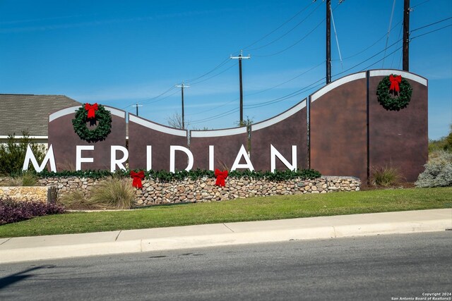 view of community sign