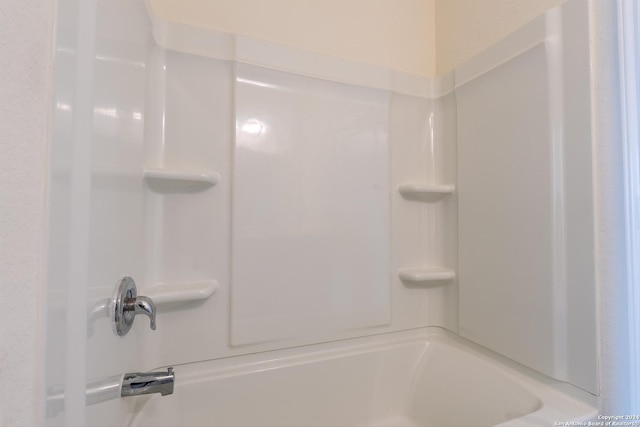 bathroom featuring washtub / shower combination