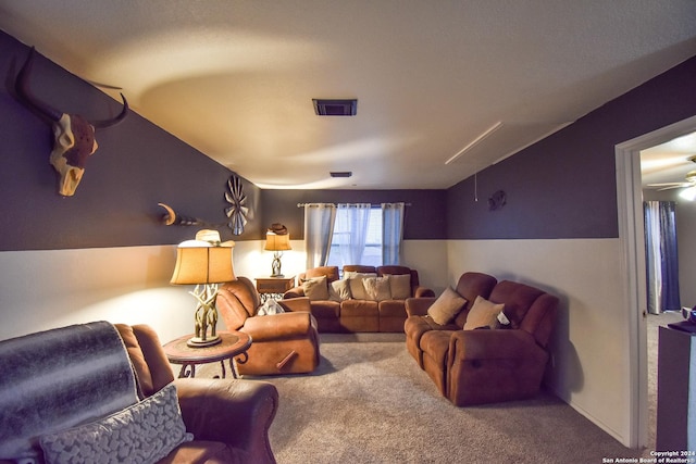 cinema featuring carpet and ceiling fan