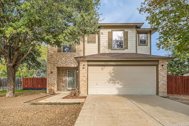 4735 Brook N, San Antonio, TX 78238 - traditional-style house with driveway, an attached garage, and brick siding