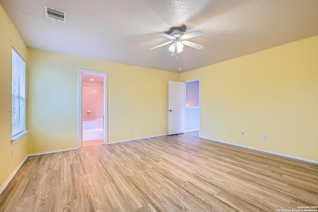 4735 Brook N, San Antonio, TX 78238 - unfurnished room with light wood-style flooring, ceiling fan, and baseboards