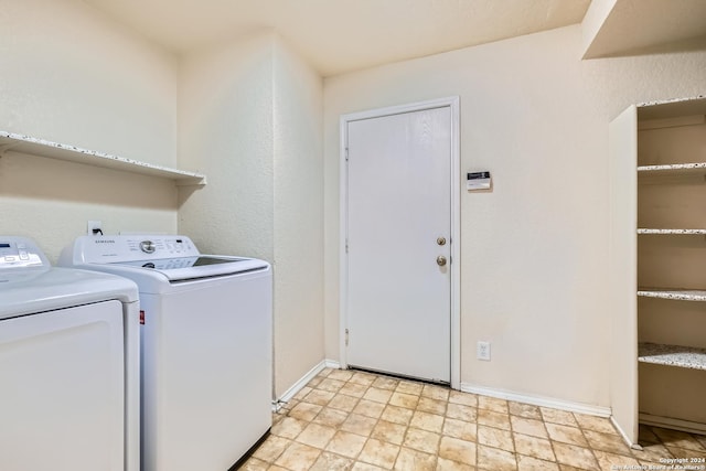 4735 Brook N, San Antonio, TX 78238 - washroom featuring independent washer and dryer, baseboards, and light stone finish flooring