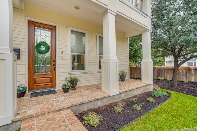 doorway to property with a balcony