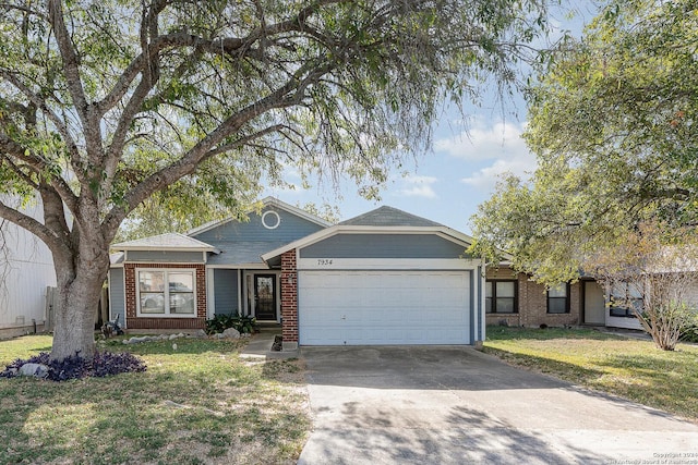 ranch-style home featuring a garage and a front yard