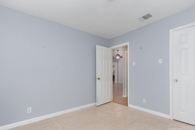 view of tiled spare room