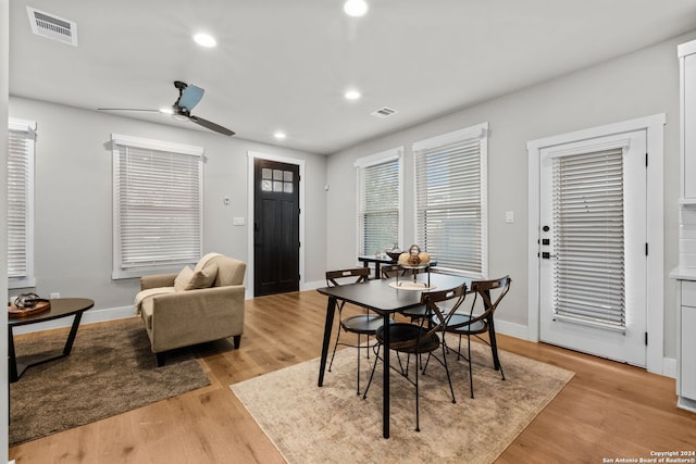 dining area featuring ceiling fan and light hardwood / wood-style floors