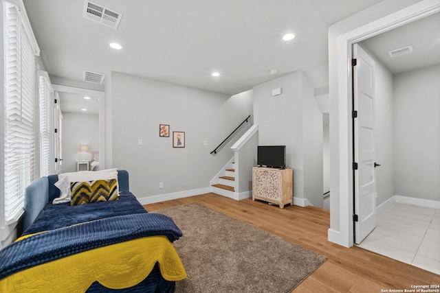 bedroom featuring wood-type flooring