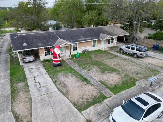 view of front of house with a carport