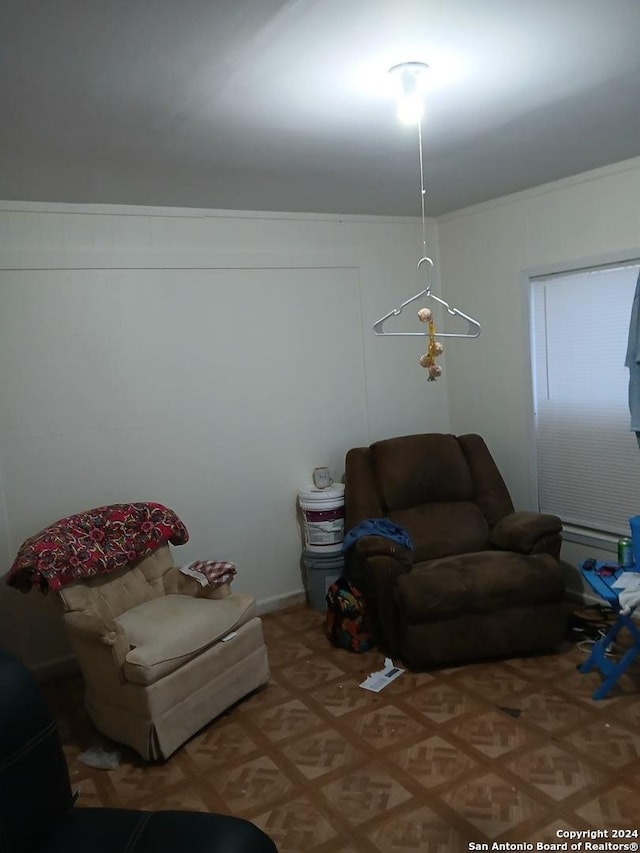 living room with ornamental molding