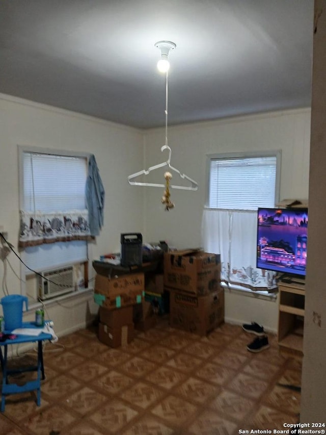 dining area with cooling unit and parquet floors