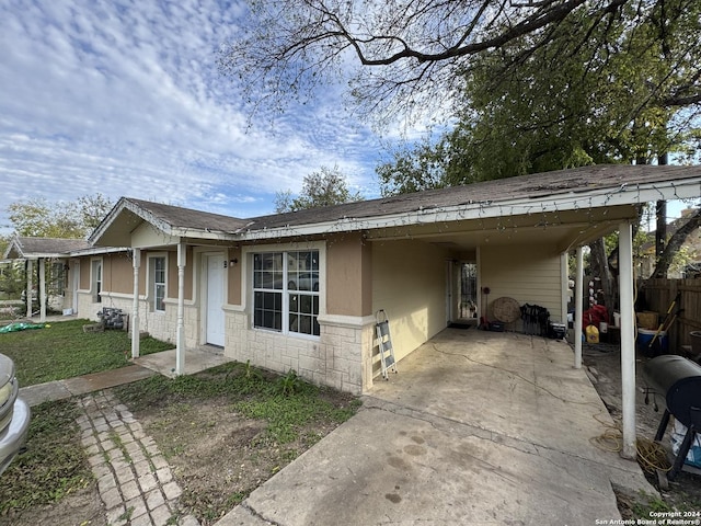 view of front of house with a carport