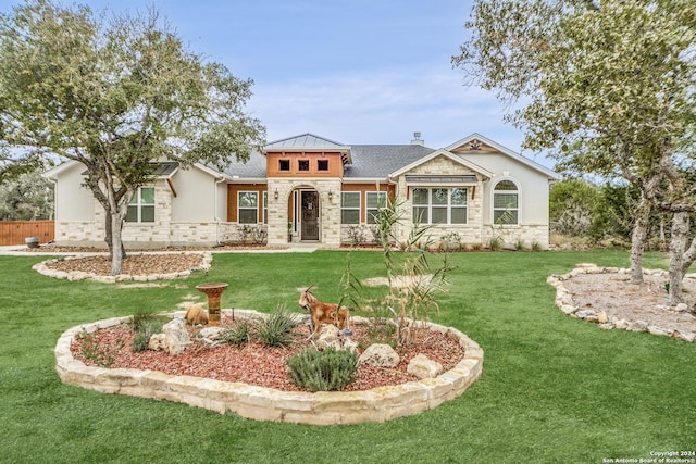 view of front of home with a front yard