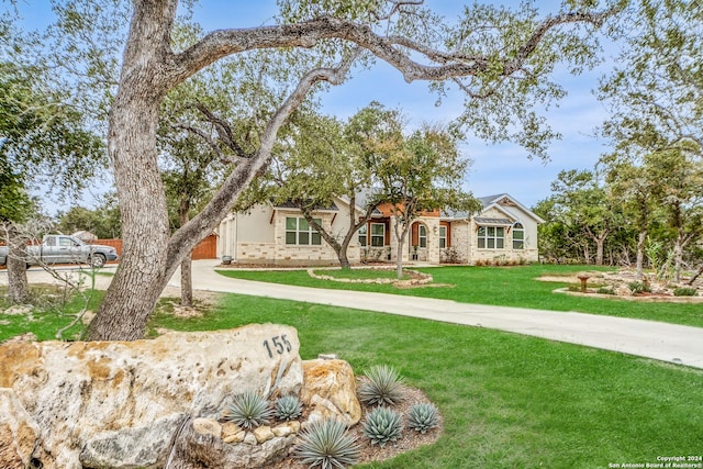 view of front of house with a front lawn